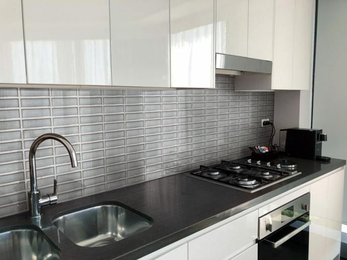 Frames grey tiles used for kitchen backsplash
